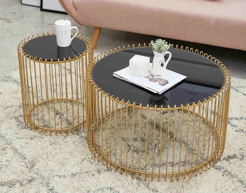 bàn trà inox mạ vàng lồng chim